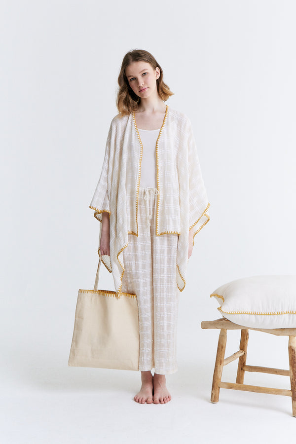 female kaftan and bag
